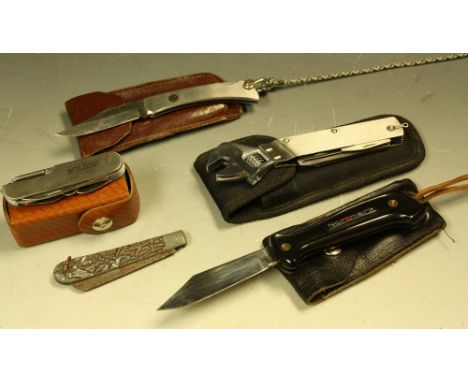 Outdoor Pursuits - a Normark EKA Knives Big Swede folding hunting knife, stainless steel blade, black handle, black leather c