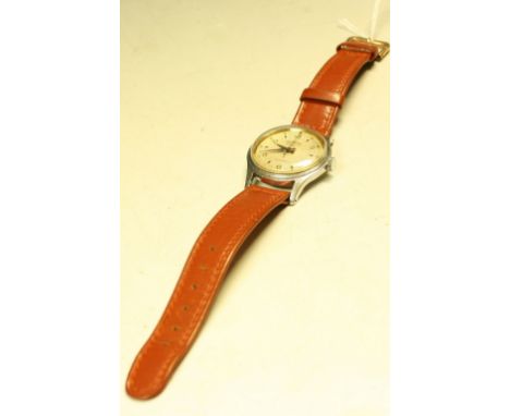 A mid 20th century Roamer Super Shock wristwatch, textured dial, alternating Arabic numerals and diamond baton markers, centr