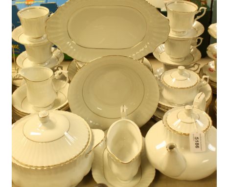 A Chodziez Polish white with gilt edge dinner and tea service, comprising tureen, serving platter, sauce boat, dinner, salad 