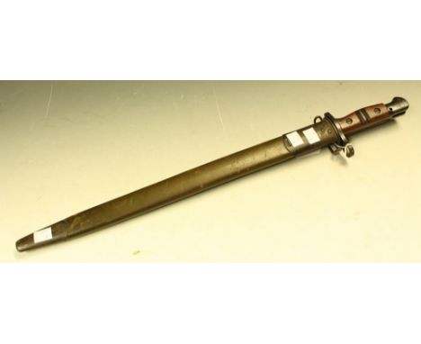 A WWI Remington bayonet, green leather scabbard, 59cm dated 1917