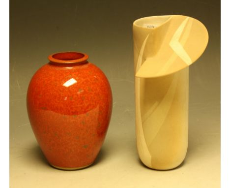 Studio Pottery - a stoneware ovoid vase, in the manner of D K Wren, glazed throughout in red with speckles of ochre, 15cm hig