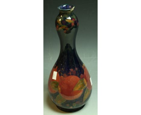 A Moorcroft Pomegranate pattern double gourd vase, 33cm, impressed mark, William Moorcroft signature in green, c.1920 Conditi