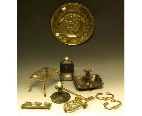 Brass and Pewter - a quantity of brassware, including a late 18th century trivet; a Masonic trivet; a chamber stick; a plate 