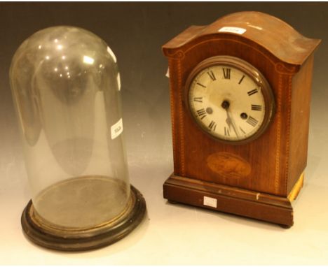 An Edwardian mahogany mantel clock, inlaid with shell paterae, the 12cm dial with twin winding holes, c.1910; a clock dome, e