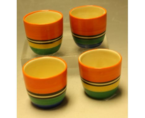 A set of four Clarice Cliff egg cups