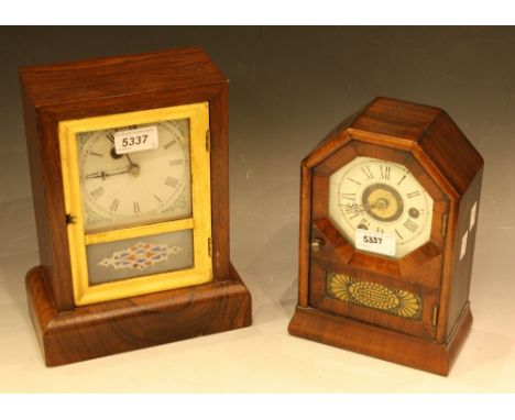 An American mahogany mantel clock, comet cut Roman numerals, 23cm; another similar rectangular, 26cm (2)