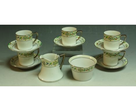 A Noritake part coffee service, decorated in the Art Deco taste with colourful geometric motifs and platinum bands, comprisin