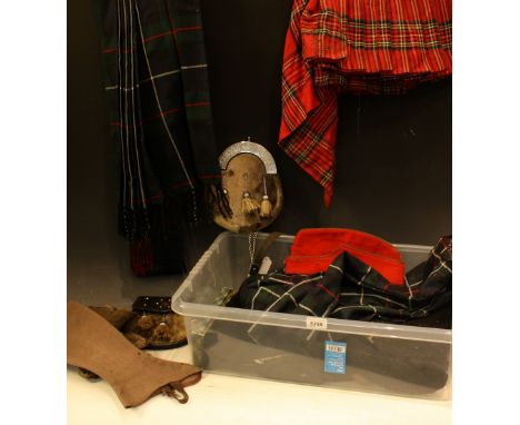 Scottish Regalia - including various Tartan kilts, sporran's, black jacket, shoulder sash, dress dirks, hats, etc