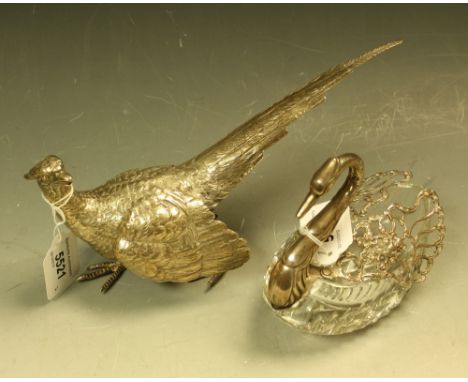 A silver and clear glass dressing table trinket dish as a swan, the openwork silver wings applied with putto musicians, marke