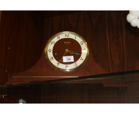 A MODERN PRESIDENT NAPOLEON HAT MANTLE CLOCK 