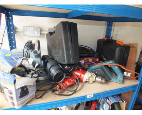 A QUANTITY OF POWER TOOLS TO INCLUDE JIGSAWS, A MITRE SAW ETC