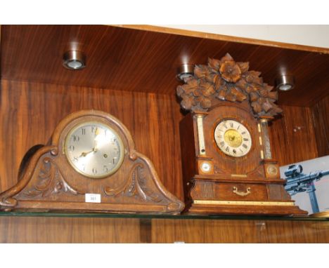 A VINTAGE CARVED OAK MANTLE CLOCK TOGETHER WITH A VINTAGE COMBINATION CLOCK A/F 