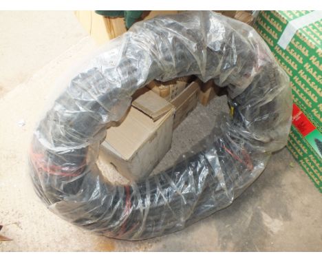 A LARGE REEL OF PIPING (HOSE PIPE ?)