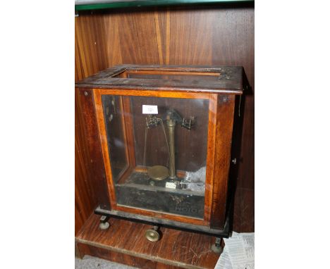 A VINTAGE MAHOGANY CASED SET OF SCALES 