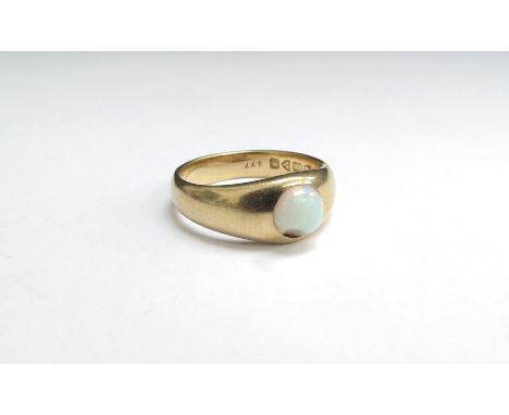 An 18ct gold ring with cabochon circular opal. (Chipped) Size O, 6.9g 