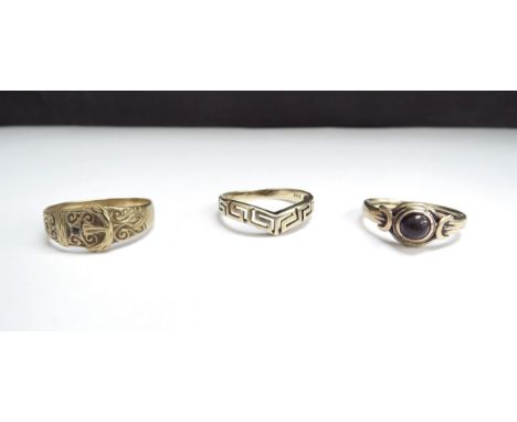 A gold Greek key design ring 585, size Q, 9ct gold engraved buckle ring, size R and an unmarked gold ring, size P, 7.7g total