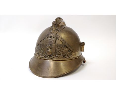 A 20th century French brass fireman's helmet