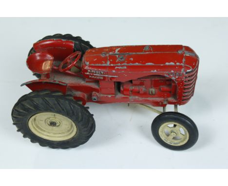 A Lesney model of a Massey Harris tractor 
