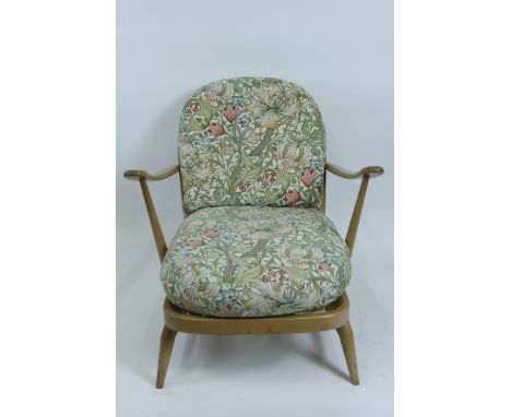 An Ercol beech and elm armchair