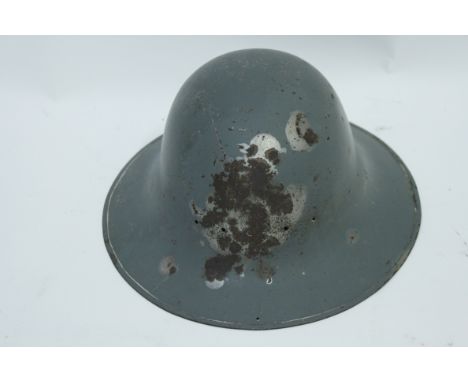 A WWII Air Raid Precaution helmet 