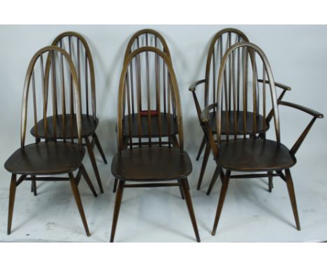 A set of four stained Ercol chairs and two carvers