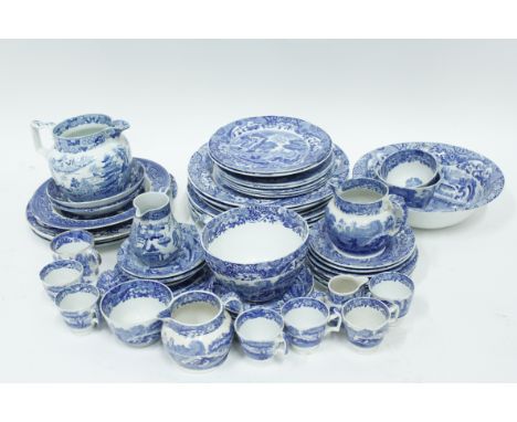 A collection of 19th century blue and white wares, including five jugs, slop bowl, large bowl, and various other items, mostl