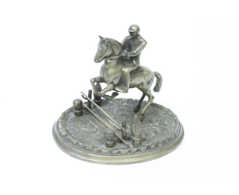 A late 20th century brass model of a horse and jockey, 28cm long 