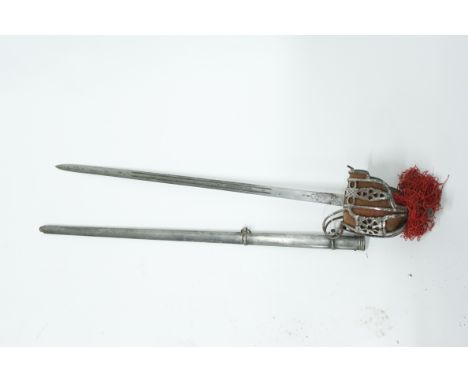 A Scottish basket hilted broadsword, the steel basket hilt having wire bound shagreen covered grip, with a steel scabbard, 10