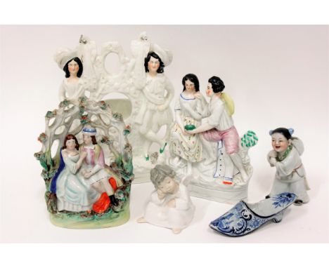 A 19th century Staffordshire watch stand, along with two other Staffordshire pieces, Lladro figure, delft shoe and a Chinese 