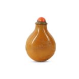 A CHINESE AGATE 'PRUNUS AND PINE' SNUFF BOTTLE.