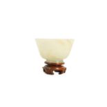 A CHINESE WHITE JADE CUP.