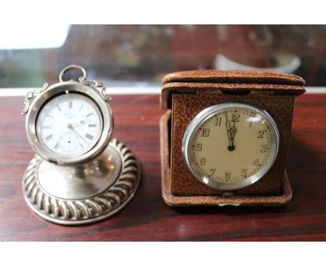 Silver Pocket watch in Silver pocket watch stand and a Deco travelling clock 