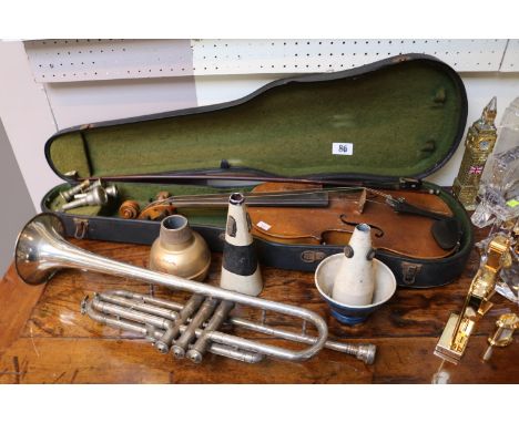 Cased Antique Violin with bow no label to interior and a International Winnipeg Musical Supply co Cornet with assorted mouthp