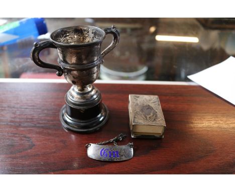 20thC Silver Trophy on wooden stand, Silver match case and a Silver Gin Label 110g total weight 