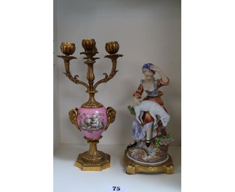European Porcelain figure of a Shepherdess with cross sword mark to base and a European Candlestick 
