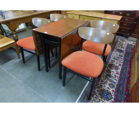 A Portwood Ltd. tola wood and black drop leaf table and four chairs 