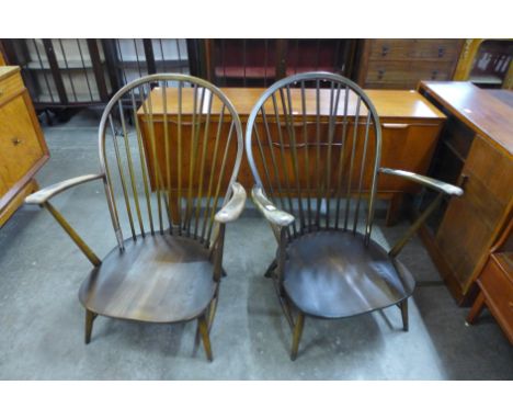 A pair of Ercol Golden Dawn elm and beech armchairs 