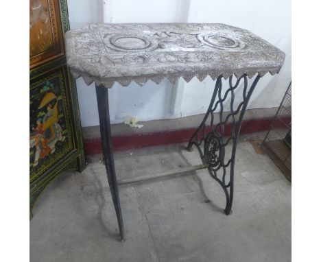 A cast iron based table 