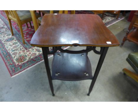 An Arts and Crafts mahogany occasional table, made by Ralph Johnson, Warrington 