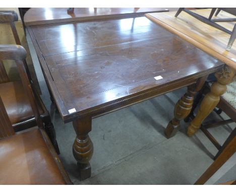 An oak fold over pastry table, four chairs and two stools 