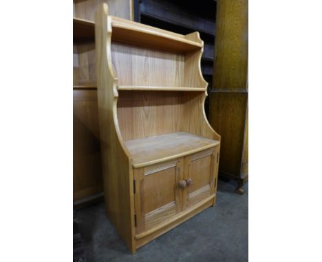 An Ercol Blonde ash open bookcase 