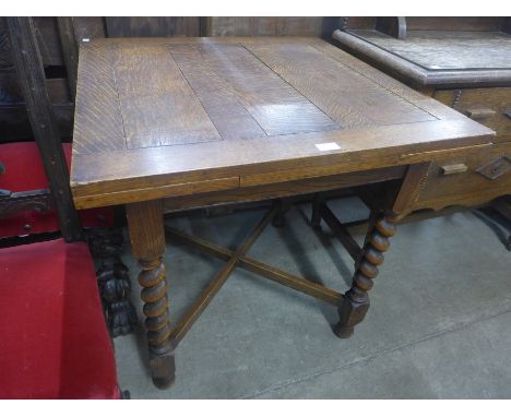 An oak barleytwist draw leaf table 