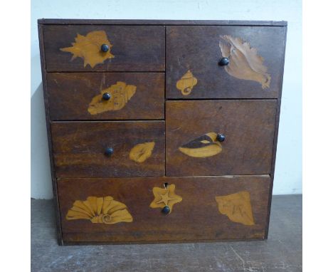 A Japanese inlaid table top kodansu cabinet and a small Japanese box decorated with insects 