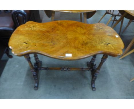 A Victorian inlaid walnut stretcher table 