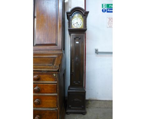 An early 20th Century oak dwarf longcase clock 