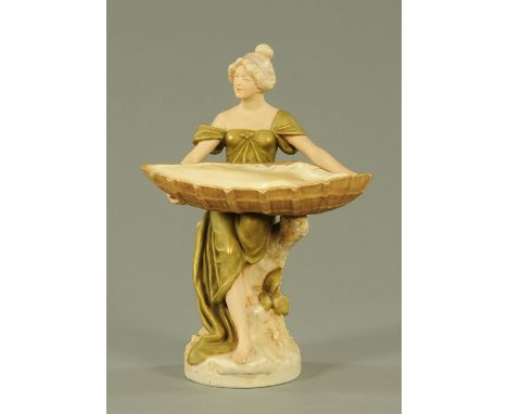 A Royal Dux Art Nouveau figure of a lady, early 20th century, modelled holding a large shell, triangular pad mark, printed ma