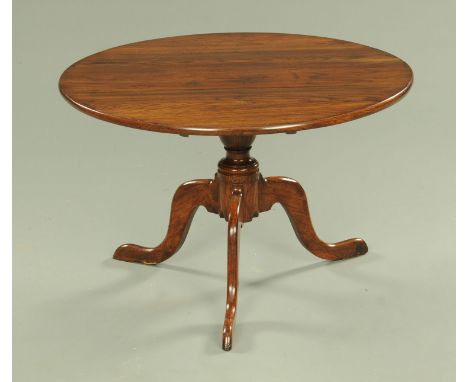 An antique oak tripod table, reduced in height to coffee table size.  Diameter 79 cm.  