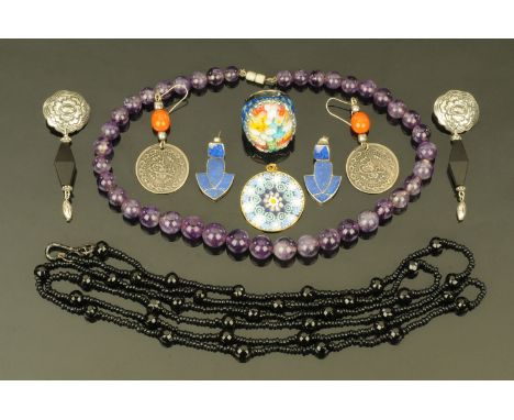 A collection of jewellery, to include a string of jet beads, pair of Turkish earrings, amethyst beaded necklace, pair of lapi