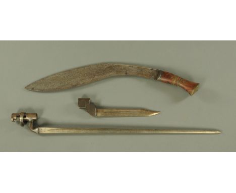 A socket bayonet, late 19th century, the ricasso struck WD,/89 blade 55 cm, together with a Gurkha Kukri, the wood handle wit