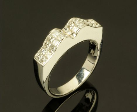 An 18 ct white gold princess cut diamond set ring, diamond weight +/- .91 carats, size M/N.